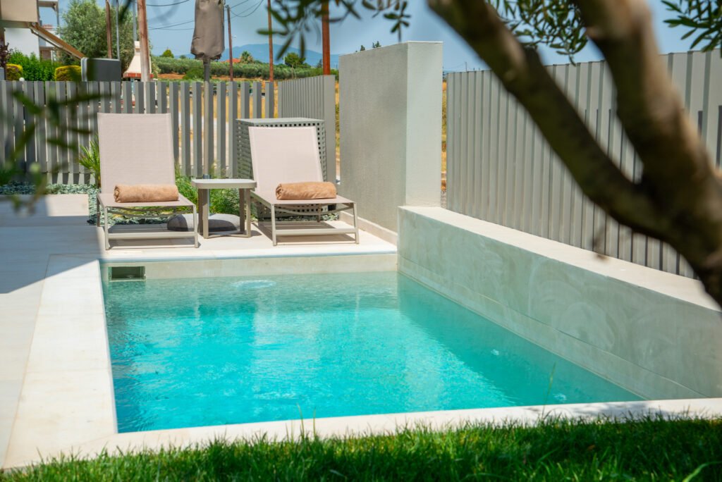 Private pool and sun loungers at NADÚ Signature Pool Suite Halkidiki