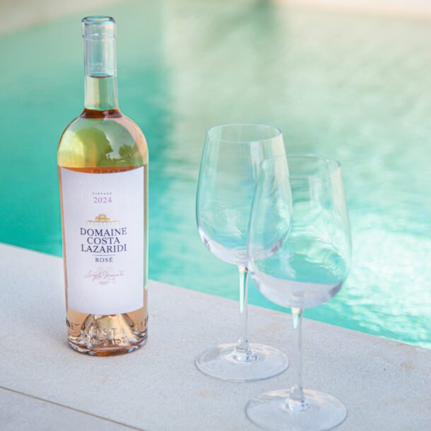 Chilled rosé wine by the pool at NADÚ Boutique Suites in Flogita Halkidiki